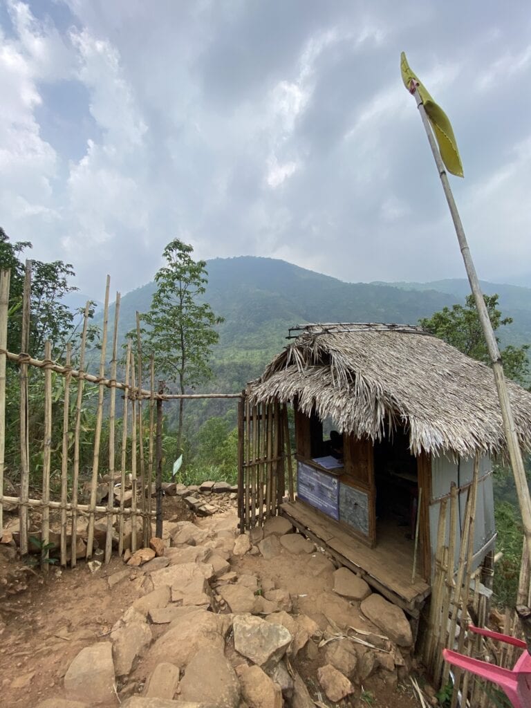 The ticket counter for the Mawrynkhang trek