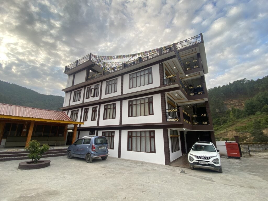 Outside view MyVillage cottages. Main building with rooms